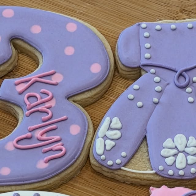 Sofia the First birthday cookies, September 20, 2026. A number 3 reading Karlyn, and a dress cookie.