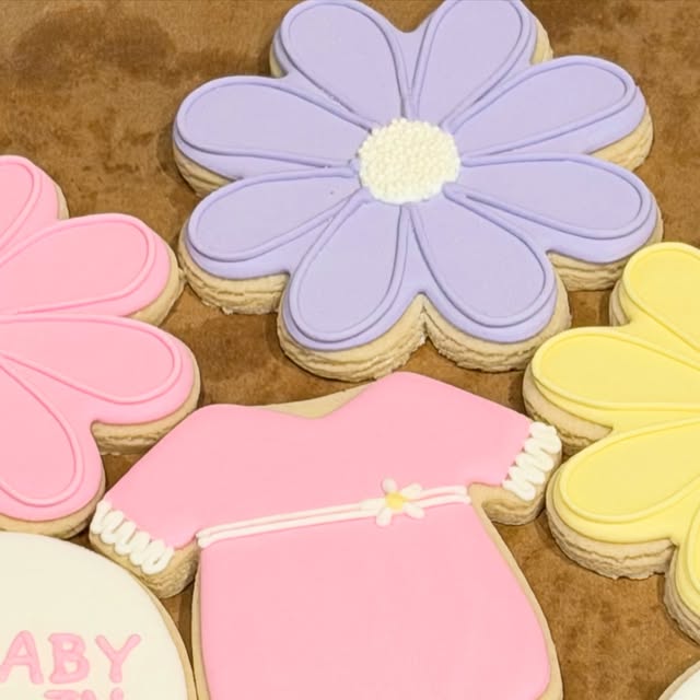 Baby in Bloom cookies: flowers and a pink baby dress cookie, July 26, 2026.