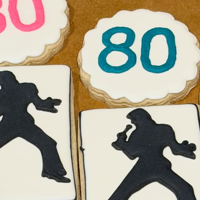 Elvis-themed 80th birthday cookies: an 80 round and Elvis silhouettes, July 20, 2026.